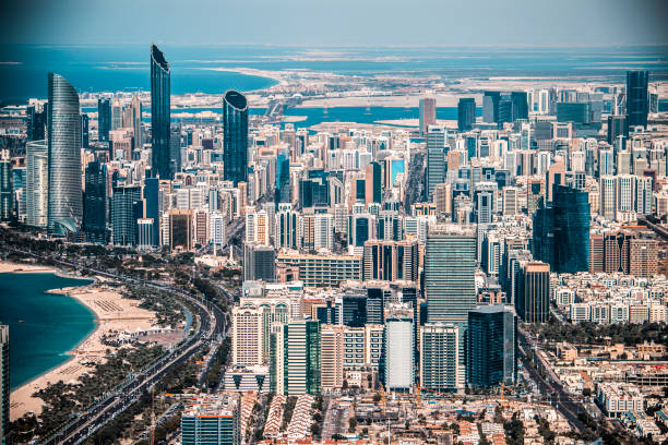 Beautiful aerial view of the Abu Dhabi downtown residential area, capturing the city beach and the city skyline.